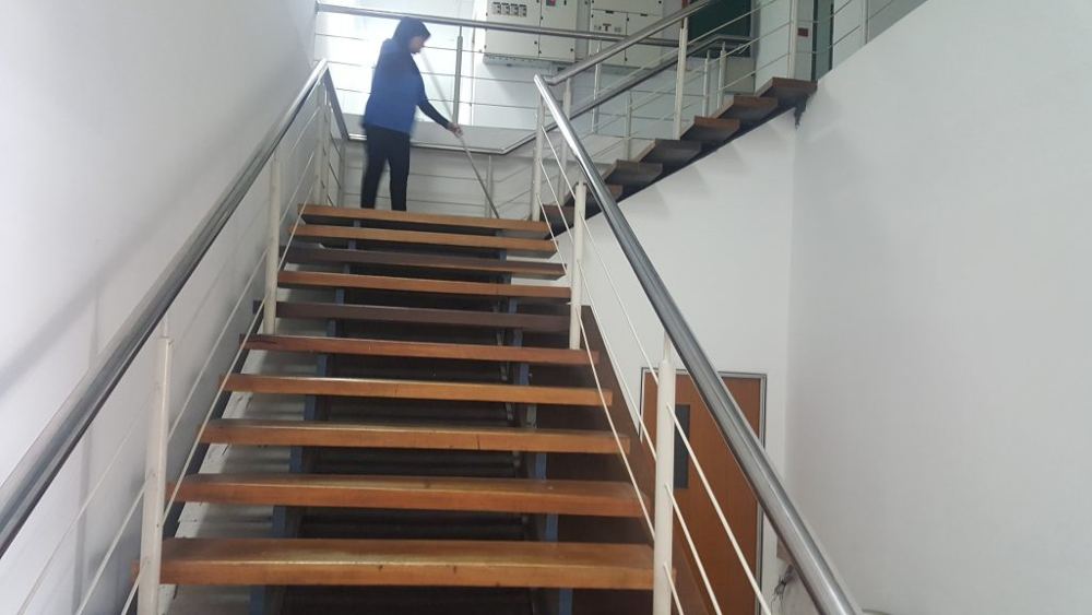 Staircase cleaning by Alam Aman Services