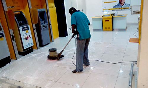 Machine floor scrubbing by Alam Aman Services