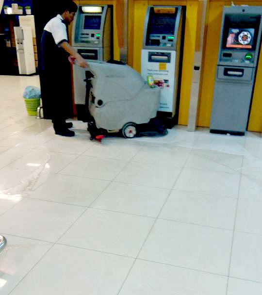 Bank branch floor scrubbing machine